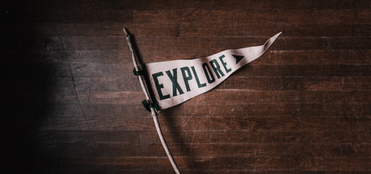 Image of flag that says Explore