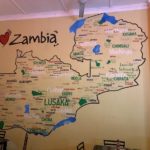 Image of painting on the wall that says I love Zambia
