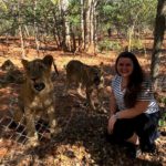 Student posting with Lions