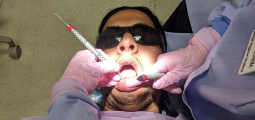 Dentist point of view looking into someone's mouth while cleaning them