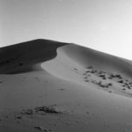 black and white image of desert