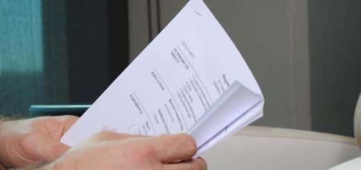image of hands holding resume